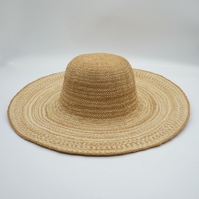 Korean version of leisure striped vacation beach with large brimmed straw hat for women's summer beach outing, sun shading, and elegant hat trend